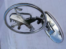 Эмблема на капот Peugeot (прицел)