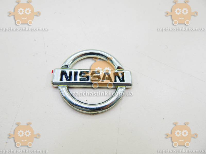 Эмблема NISSAN (надпись) на двухстороннем скотче (Габариты: 47х41мм) - фото